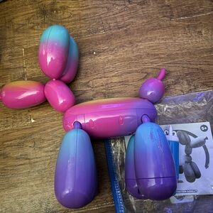 Squeakies interactive balloon animal rainbow dog